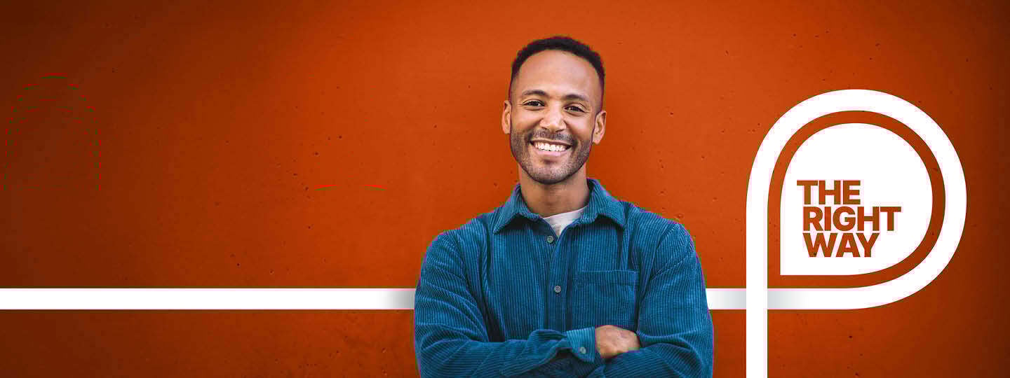 TS_RM_2025_Man_On_Dark_Orange_Wall_Web_Banner_Horiz